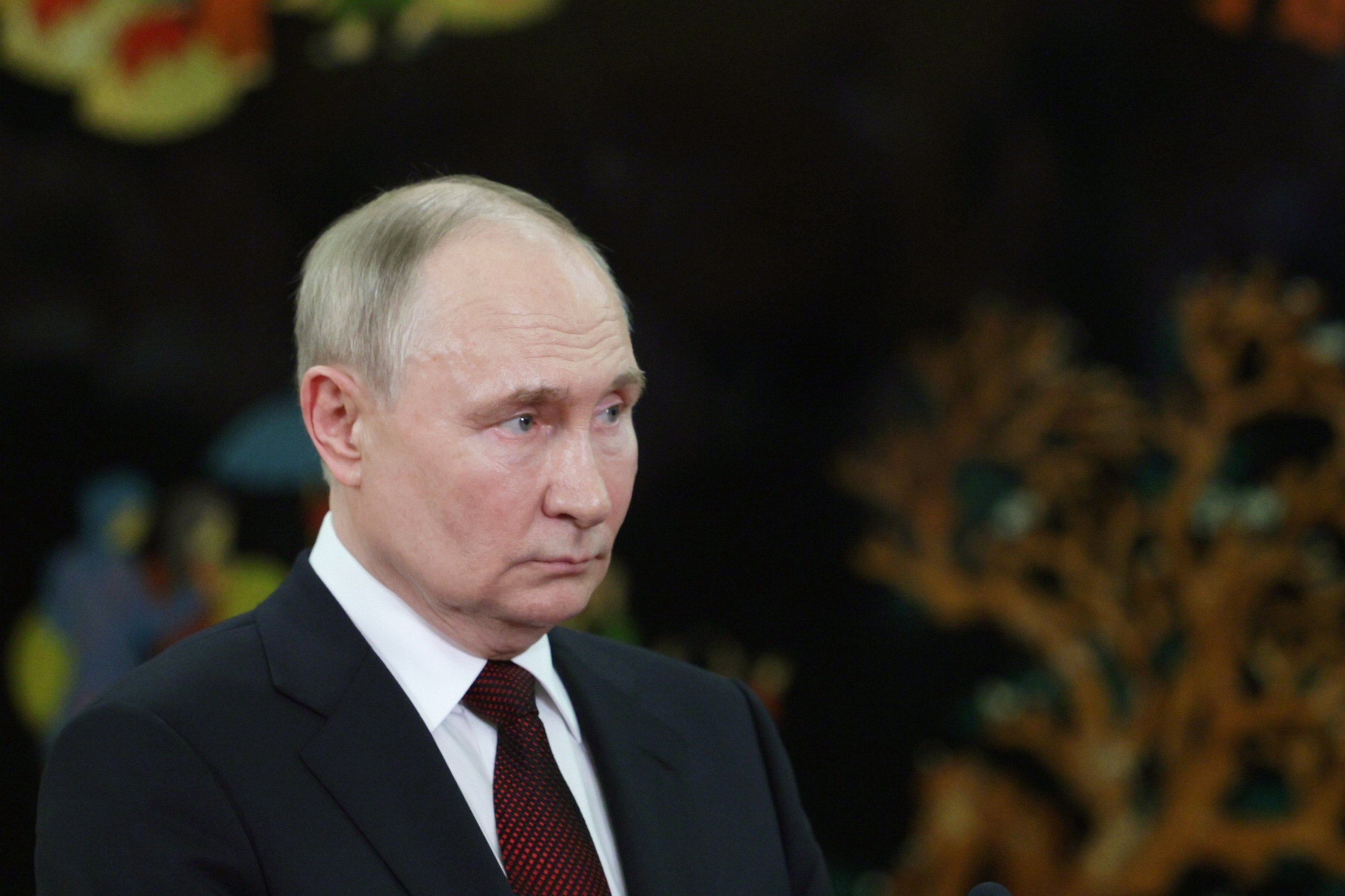 Путин